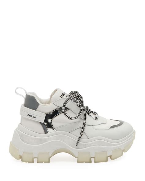 prada white platform sneakers.